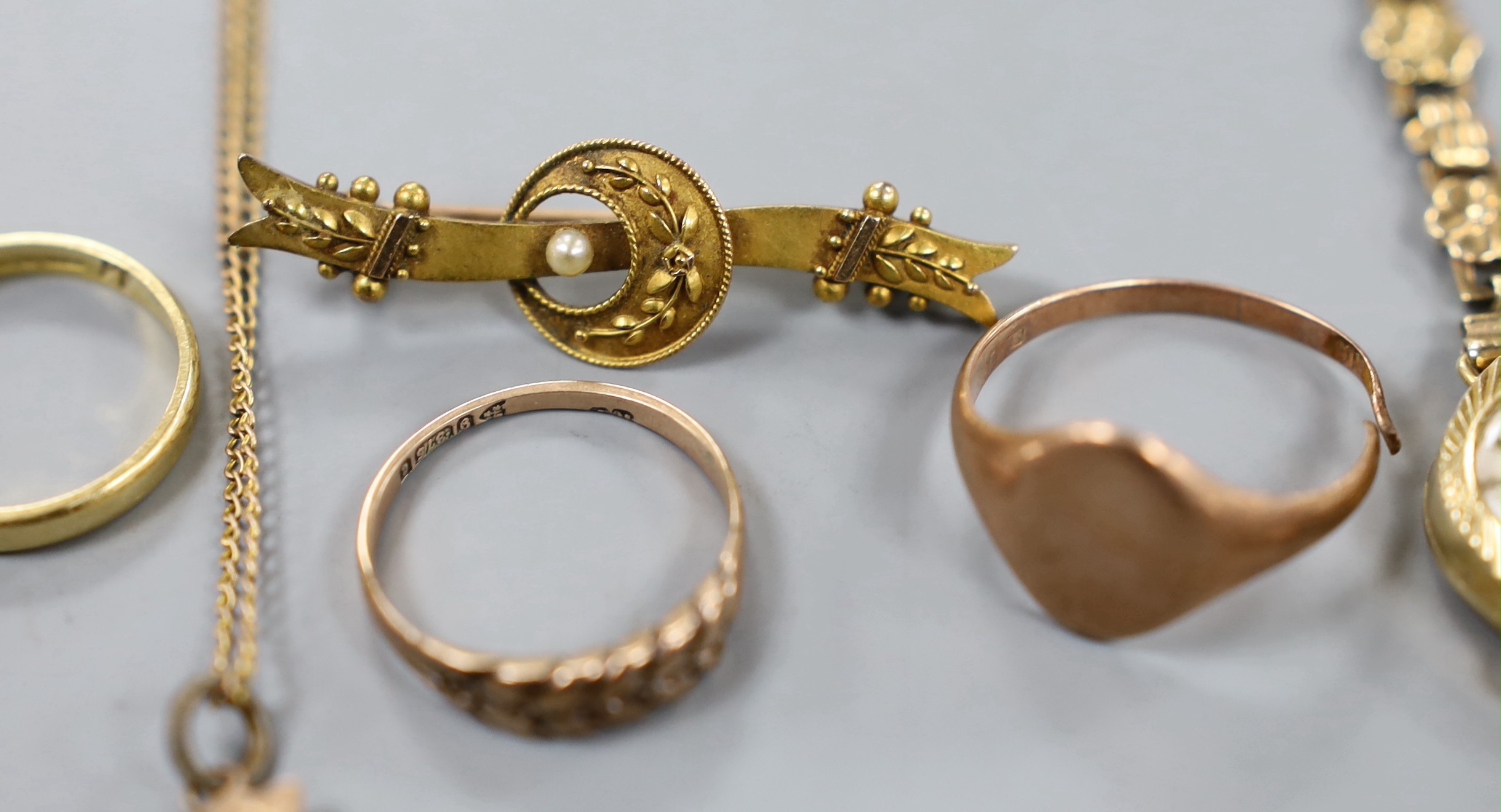 A lady's 9ct gold Accurist manual wind wrist watch, on a 9ct gold bracelet, gross weight 11.2 grams, one other lady's yellow metal wrist watch, three 9ct gold rings, a 9ct gold bracelet, a 9ct cross pendant on 9ct chain,